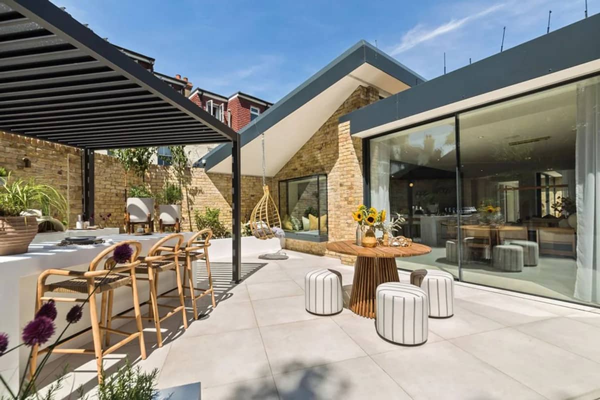 Courtyard and completed finish used to illustrate construction handover.