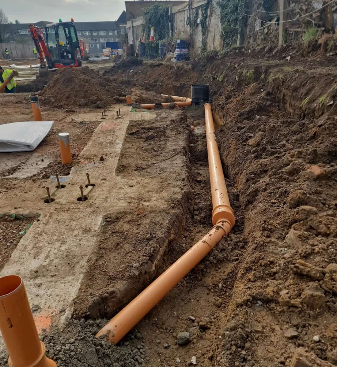Drainage and below-ground works from Chadwell Heath project leadership experience.